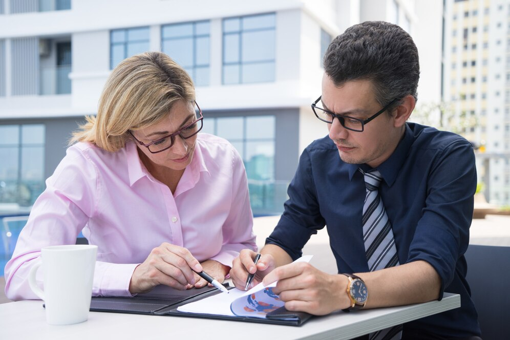 People reviewing documents